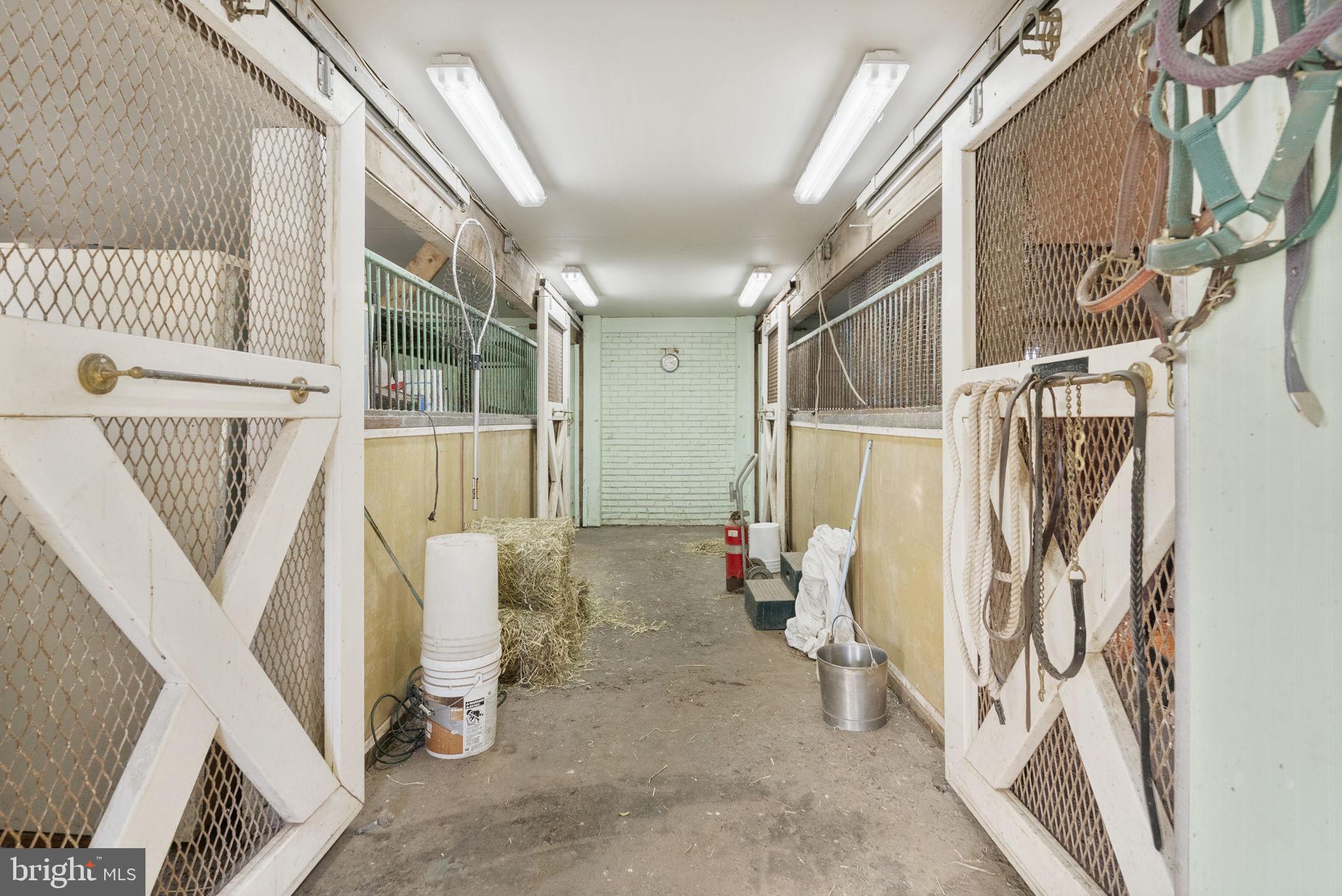 185 Spring Hollow Road Spring City, PA 19475 - Photo 27 of 33 a view of walk in closet with clothes and shoes