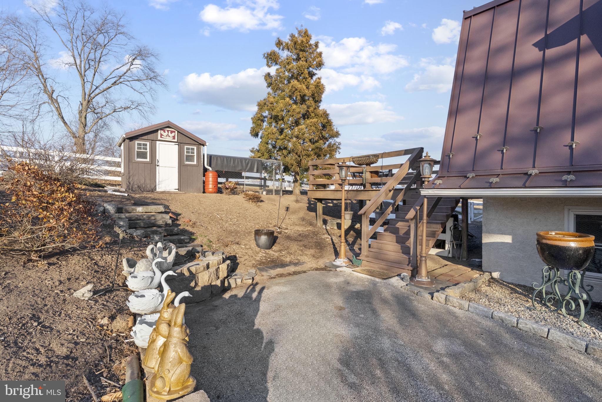 185 Spring Hollow Road Spring City, PA 19475 - Photo 28 of 33 a view of a chairs and table in the patio