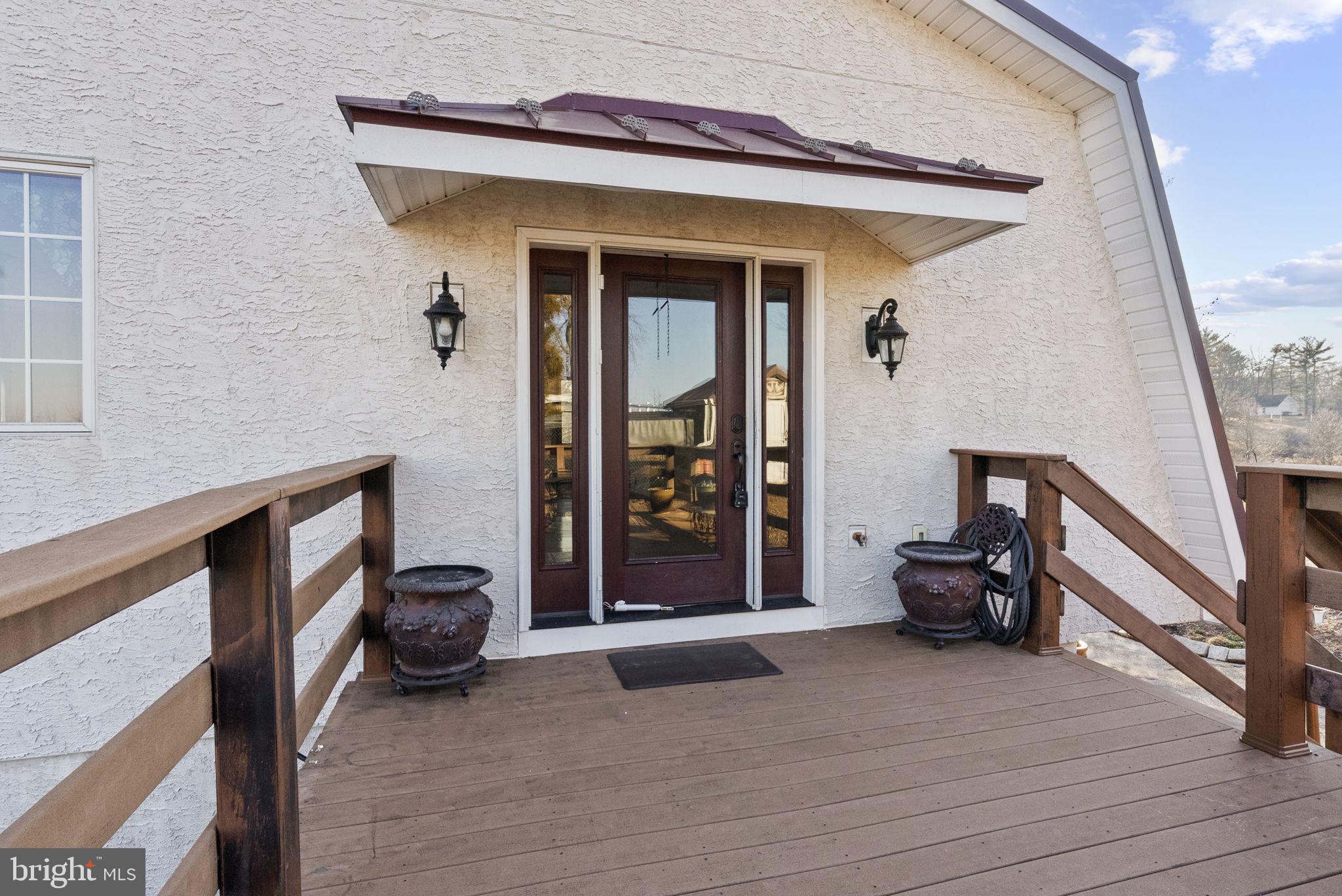 185 Spring Hollow Road Spring City, PA 19475 - Photo 4 of 33 a view of a livingroom with furniture and front door