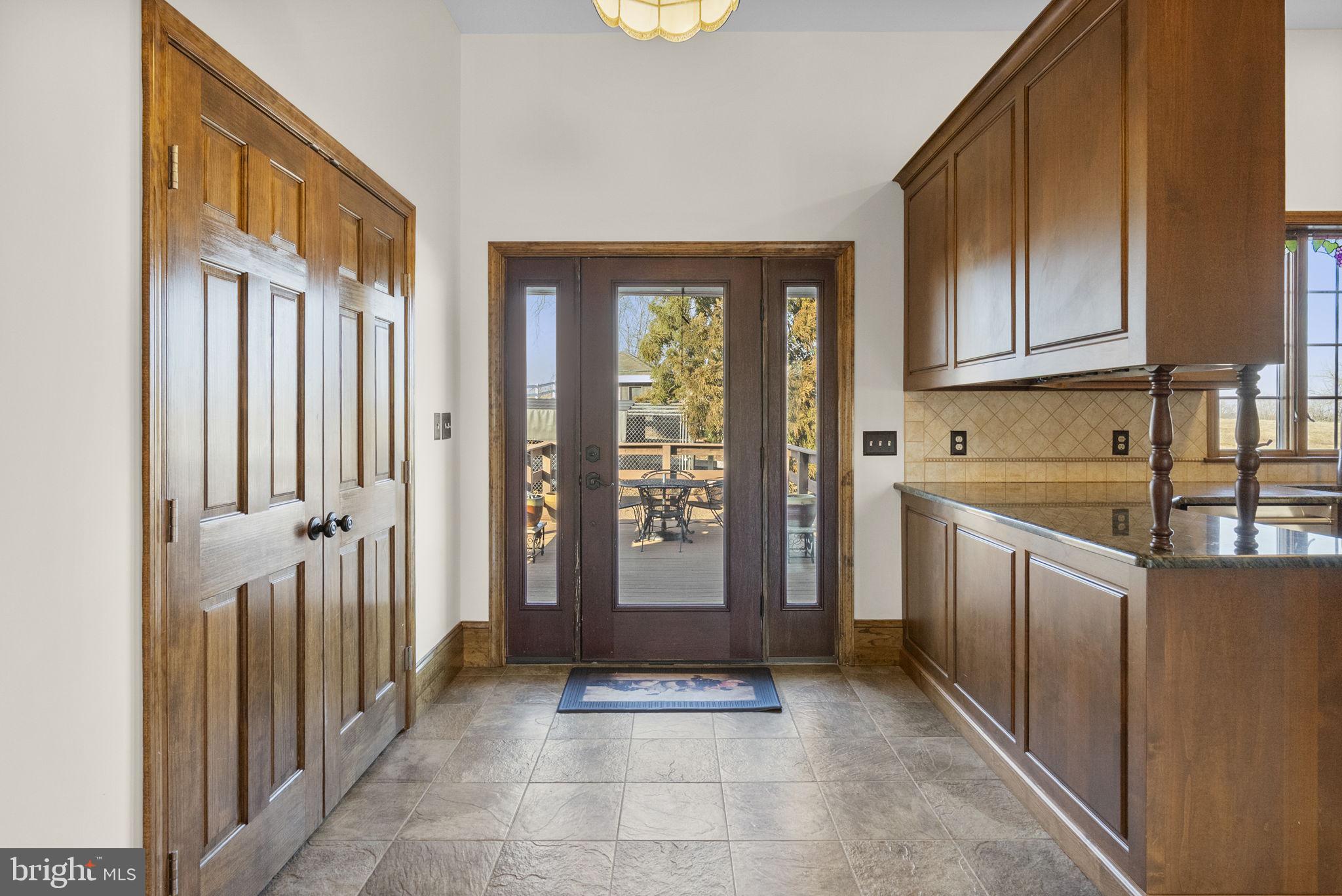 185 Spring Hollow Road Spring City, PA 19475 - Photo 7 of 33 a view of a kitchen with an empty space and a sink