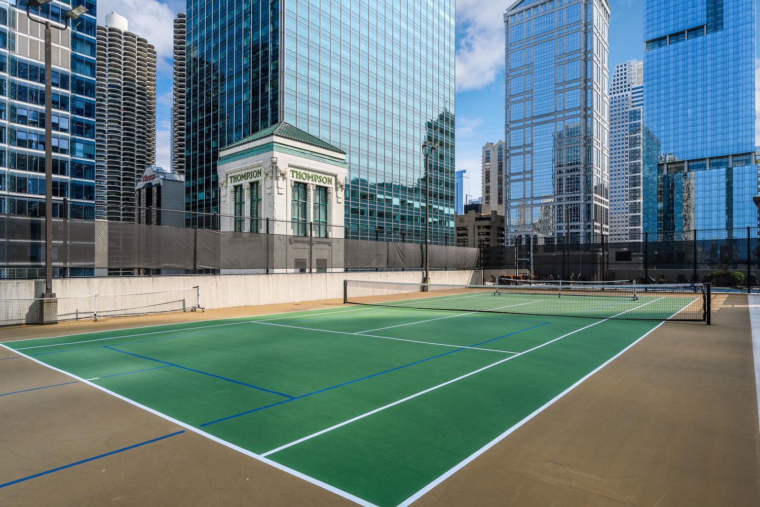 345 North LaSalle Drive, Unit 2505 Chicago, IL 60654 - Photo 14 of 16 a view of a patio with a swimming pool