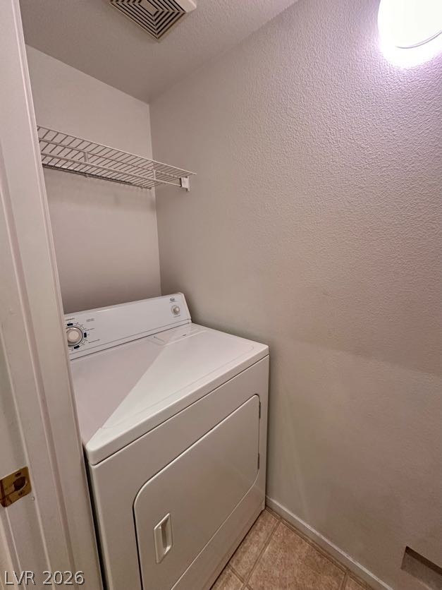 7255 West Sunset Road, Unit 1027 Las Vegas, NV 89113 - Photo 10 of 25 A well-appointed laundry closet offers convenience and practicality.