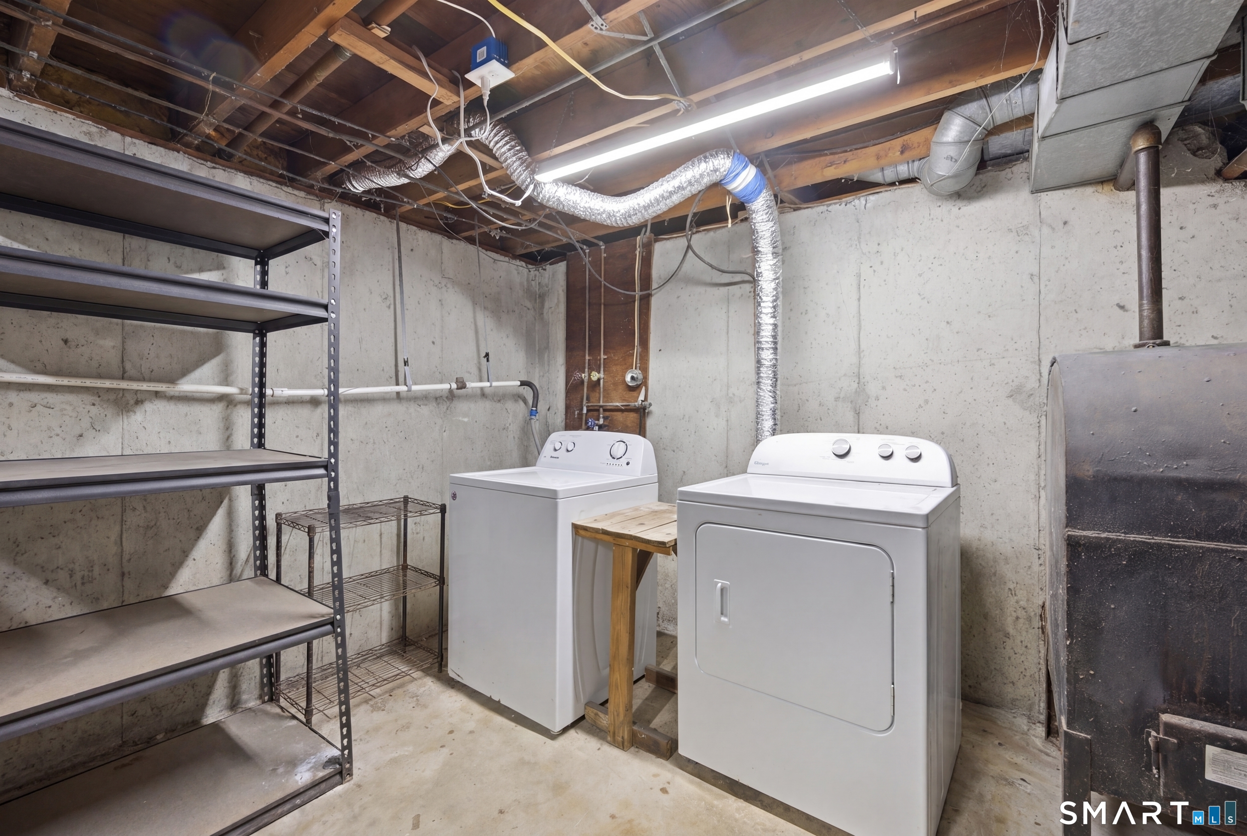 121 River Road Preston, CT 06365 - Photo 23 of 37 a utility room with dryer and washer