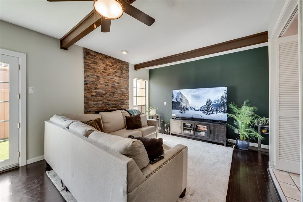 2652 Entrada Boulevard Irving, TX 75038 - Photo 12 of 28 a living room with furniture and a fireplace