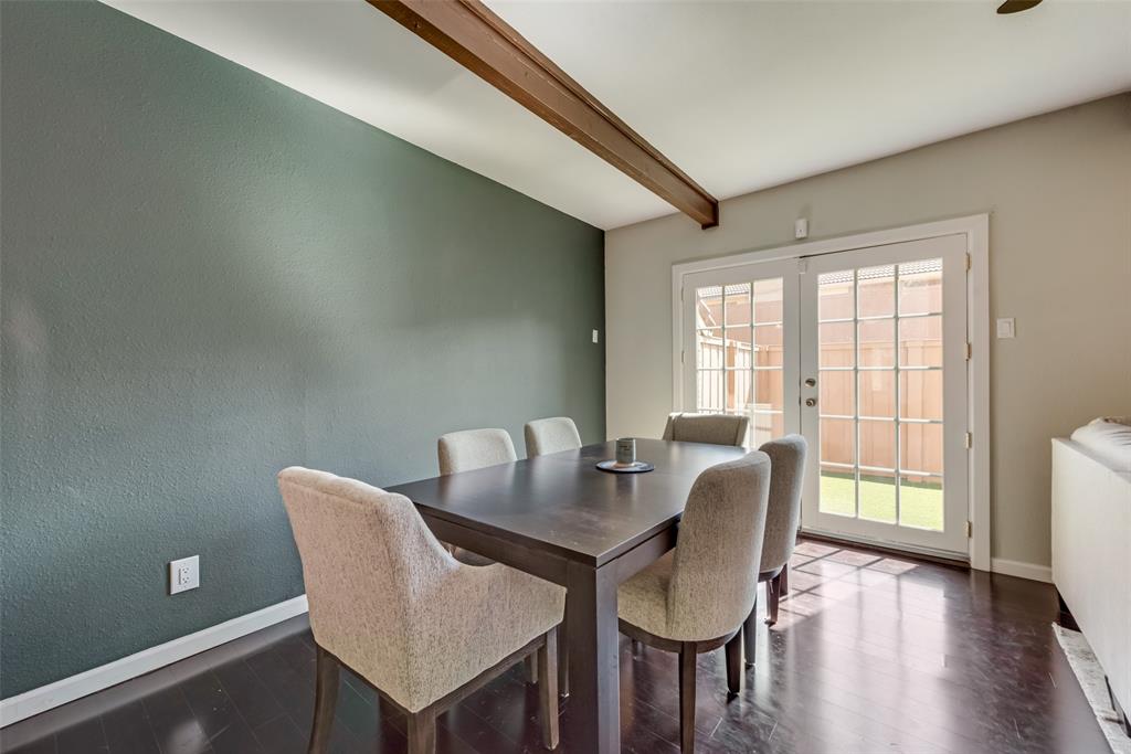 2652 Entrada Boulevard Irving, TX 75038 - Photo 14 of 28 a view of a dining room with furniture window and wooden floor
