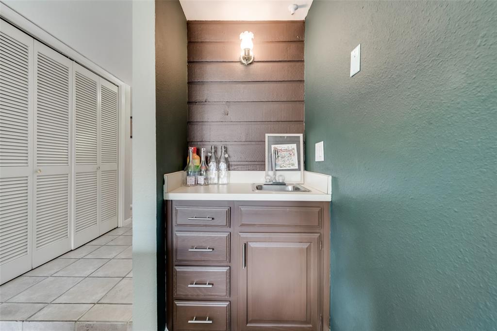 2652 Entrada Boulevard Irving, TX 75038 - Photo 16 of 28 a bathroom with a sink and a mirror
