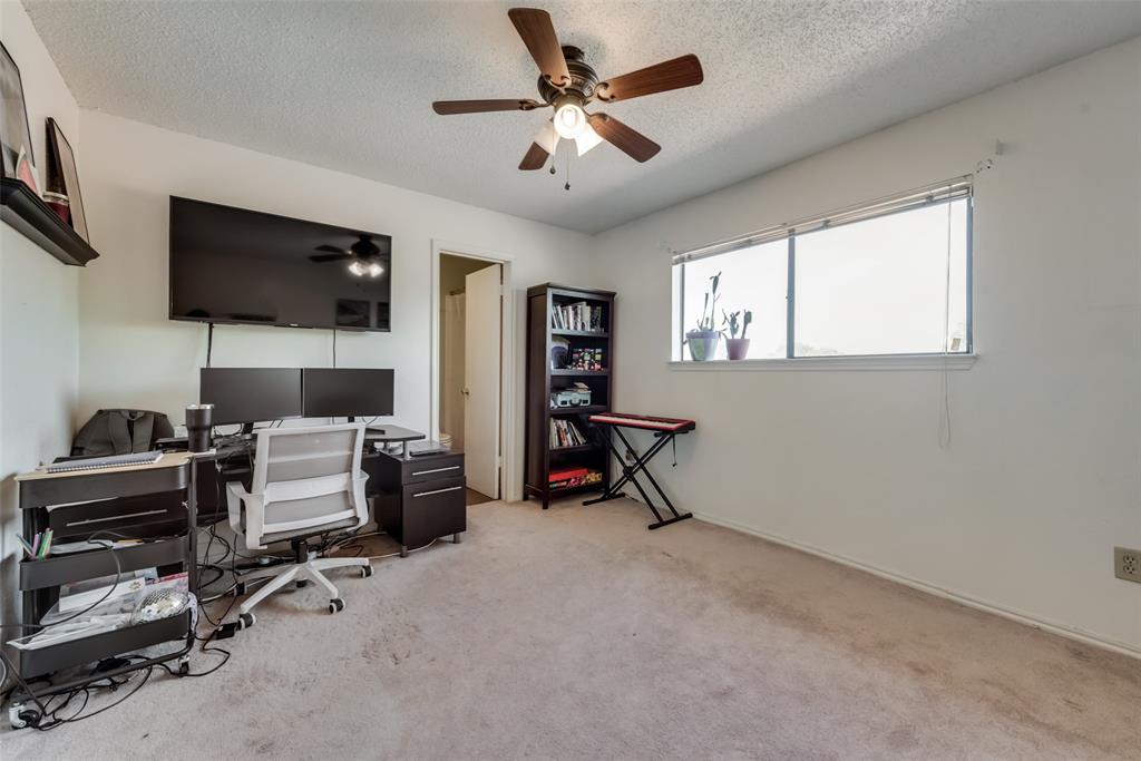 2652 Entrada Boulevard Irving, TX 75038 - Photo 18 of 28 a view of a livingroom with workspace and a window