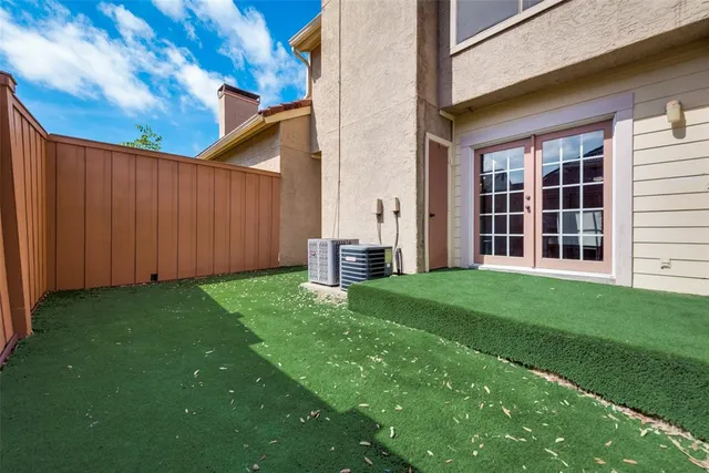 a view of backyard with deck