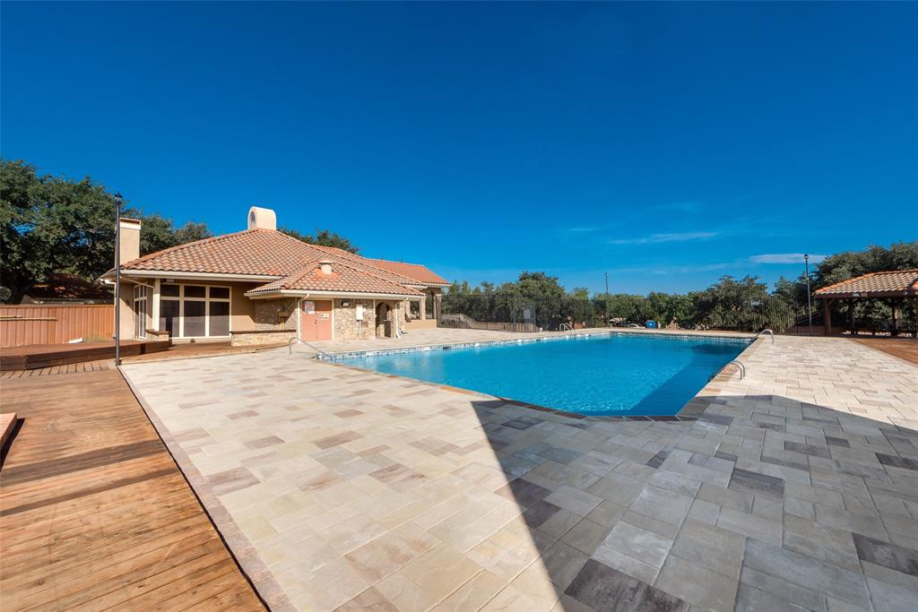 2652 Entrada Boulevard Irving, TX 75038 - Photo 27 of 28 a view of a house with pool and a yard
