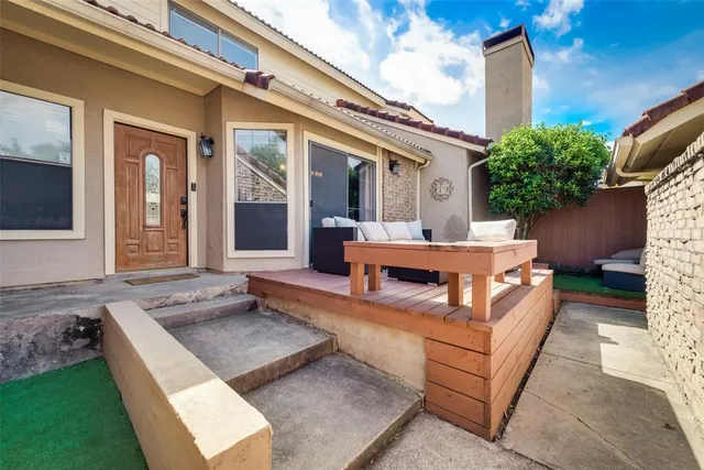 a building outdoor space with patio furniture