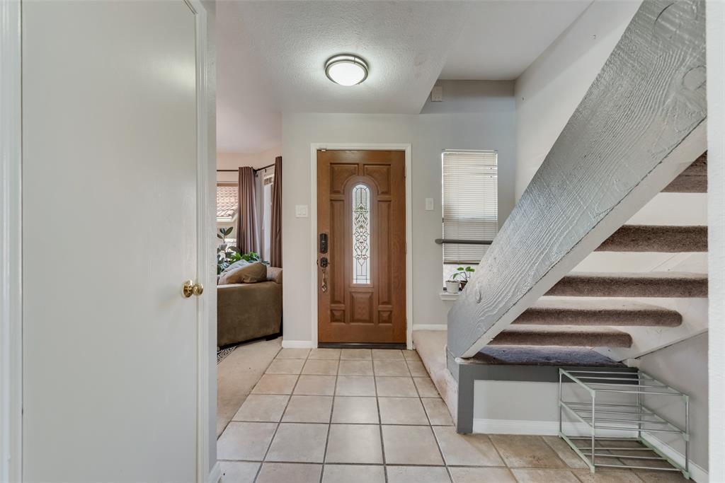 2652 Entrada Boulevard Irving, TX 75038 - Photo 5 of 28 a view of an entryway with wooden floor