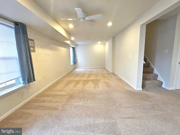 a view of a hallway with a large window