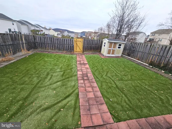 a view of a backyard with a garden
