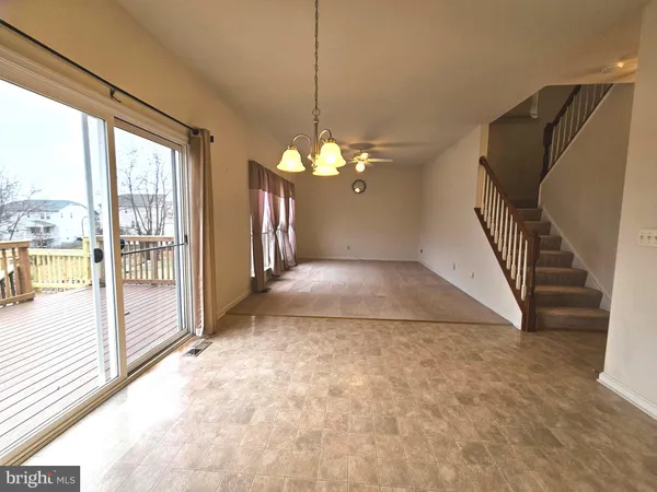 a view of a livingroom with a staircase