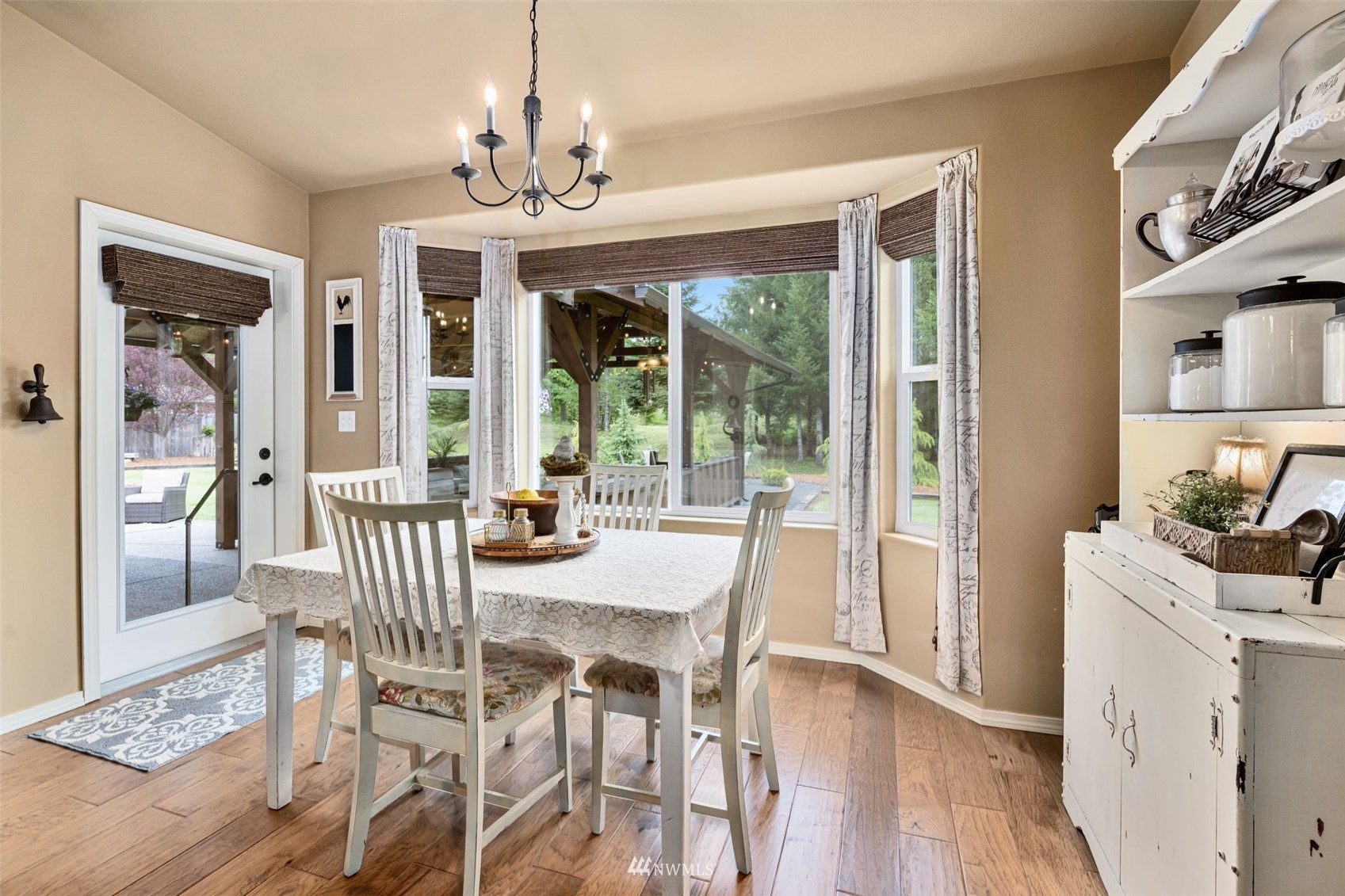 280 Chandler Road Chehalis, WA 98532 - Photo 17 of 40 a view of a dining room with furniture wooden floor and chandelier