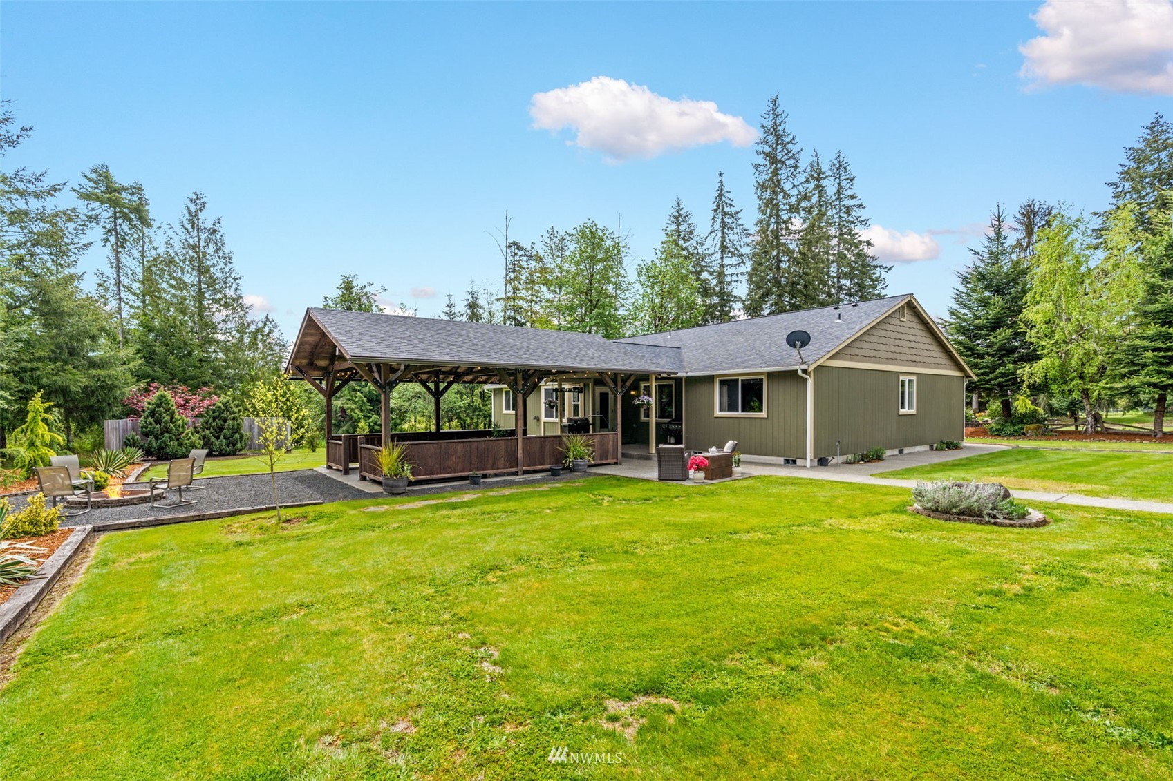 280 Chandler Road Chehalis, WA 98532 - Photo 3 of 40 a view of a house with a yard porch and sitting area