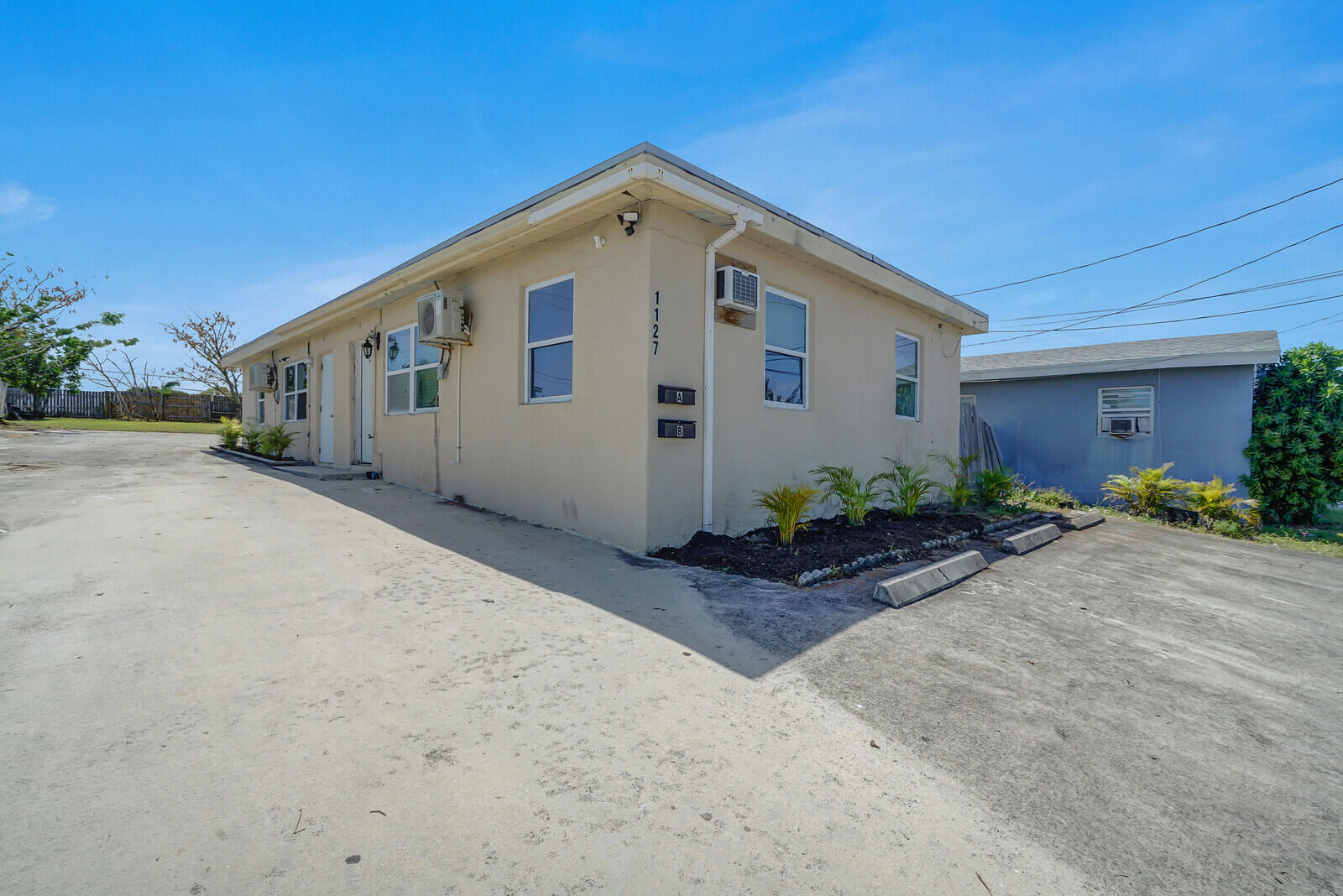 1127 West 28th Street, Unit A Riviera Beach, FL 33404 - Photo 1 of 17 Outside street view