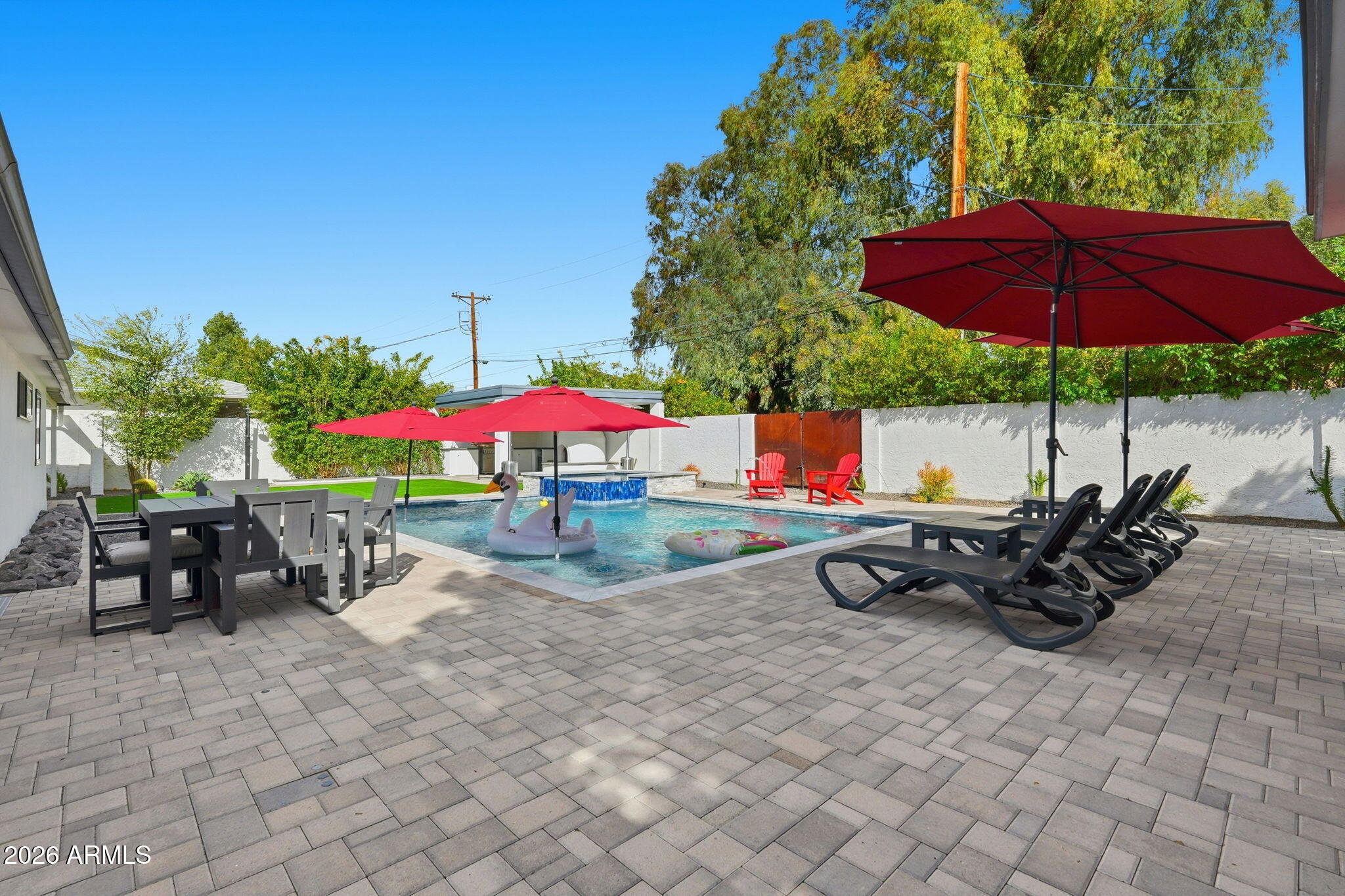 5149 North 34th Street Phoenix, AZ 85018 - Photo 49 of 70 an outdoor space with furniture and umbrella