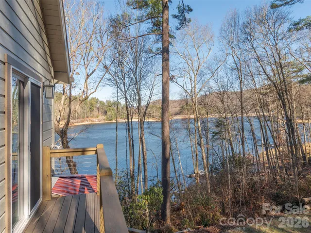 a balcony view with outdoor seating