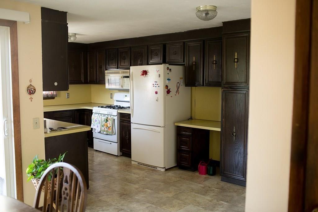 280 Harkness Avenue Springfield, MA 01118 - Photo 12 of 36 a kitchen with a refrigerator sink and stove