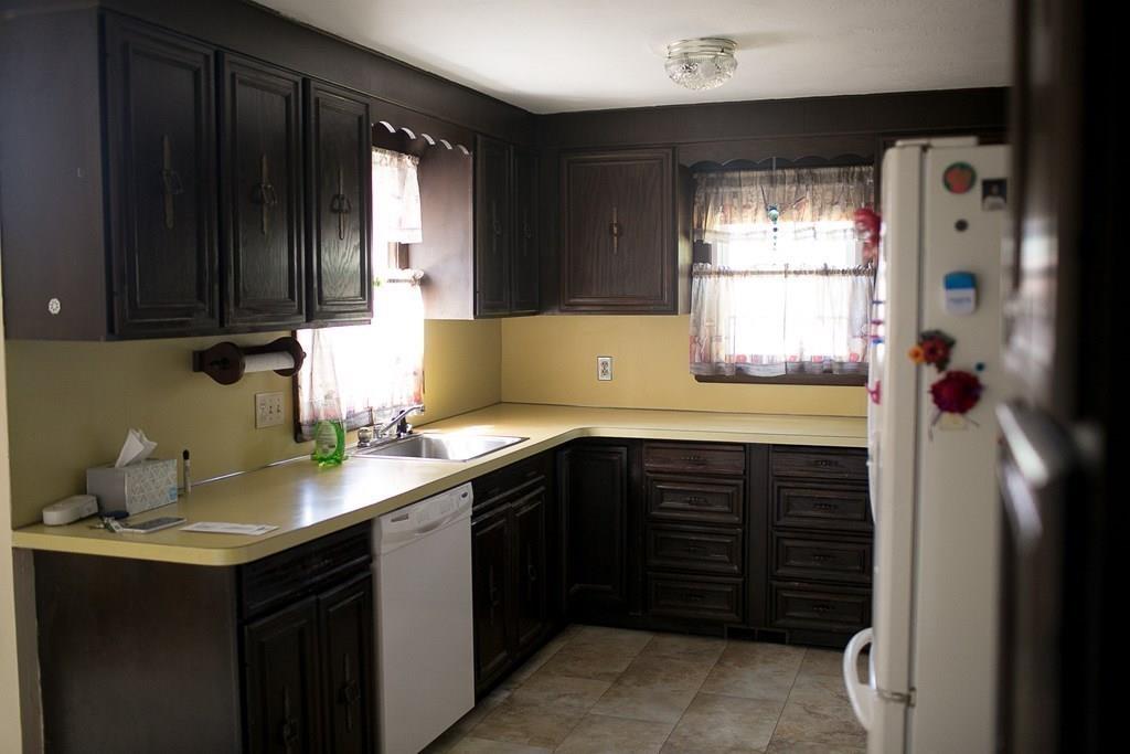 280 Harkness Avenue Springfield, MA 01118 - Photo 13 of 36 a kitchen with a sink and cabinets
