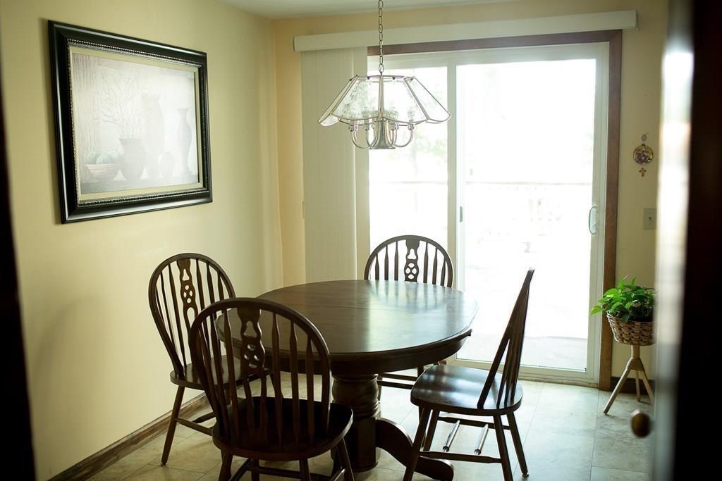 280 Harkness Avenue Springfield, MA 01118 - Photo 14 of 36 a view of a dining room with furniture and window