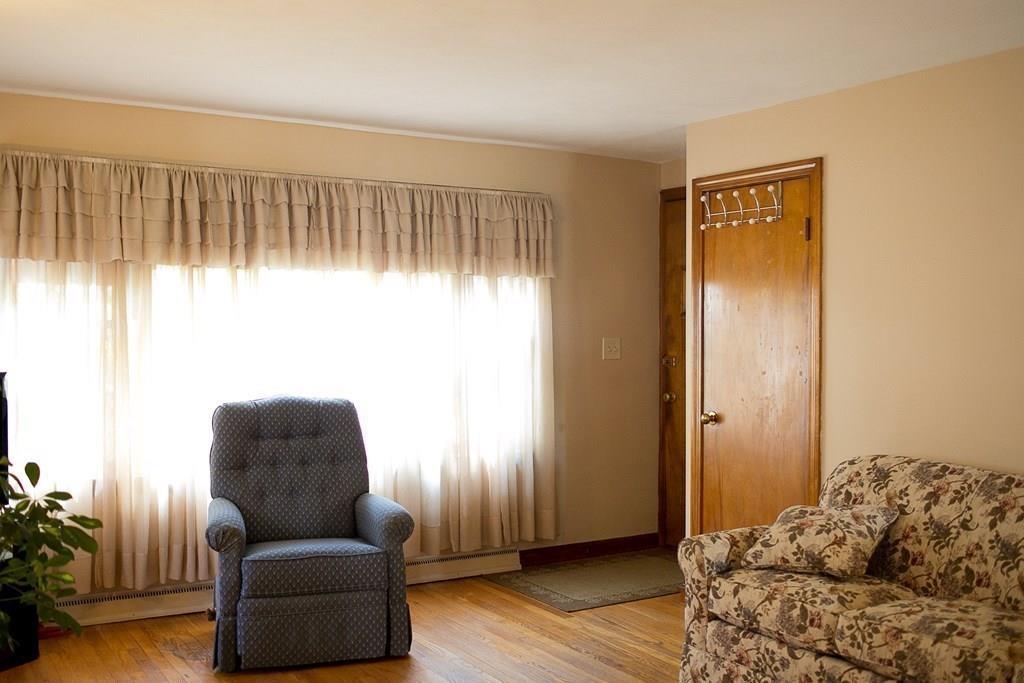 280 Harkness Avenue Springfield, MA 01118 - Photo 18 of 36 a living room with furniture and a window