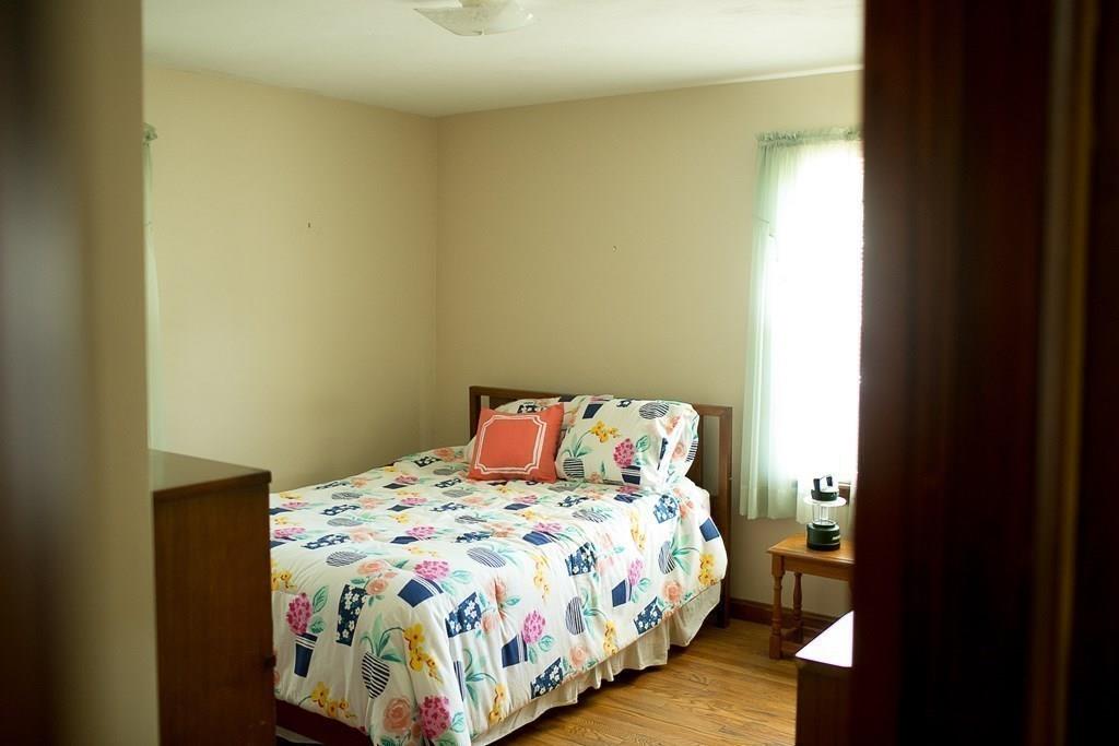 280 Harkness Avenue Springfield, MA 01118 - Photo 24 of 36 a bedroom with a bed and a window