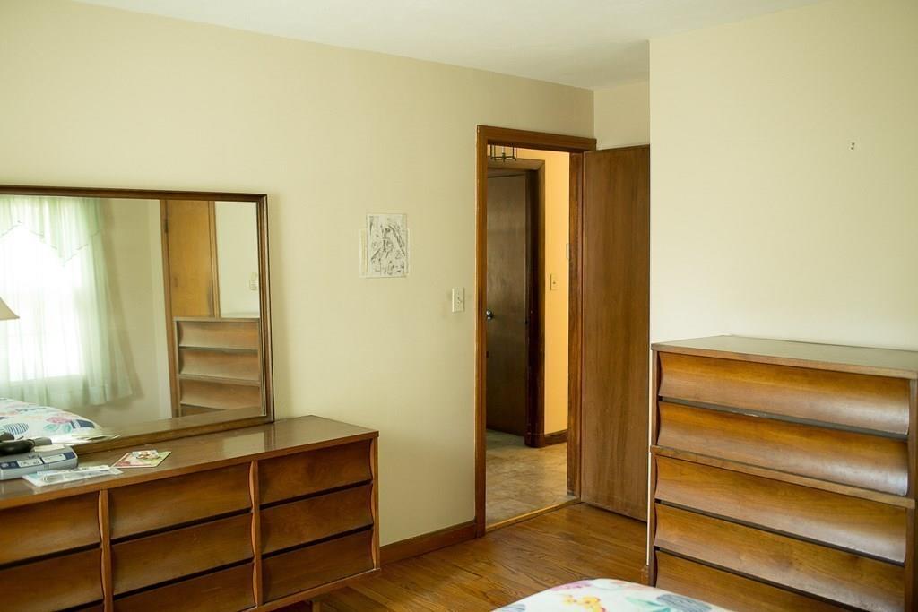 280 Harkness Avenue Springfield, MA 01118 - Photo 25 of 36 a view of walk in closet with empty racks