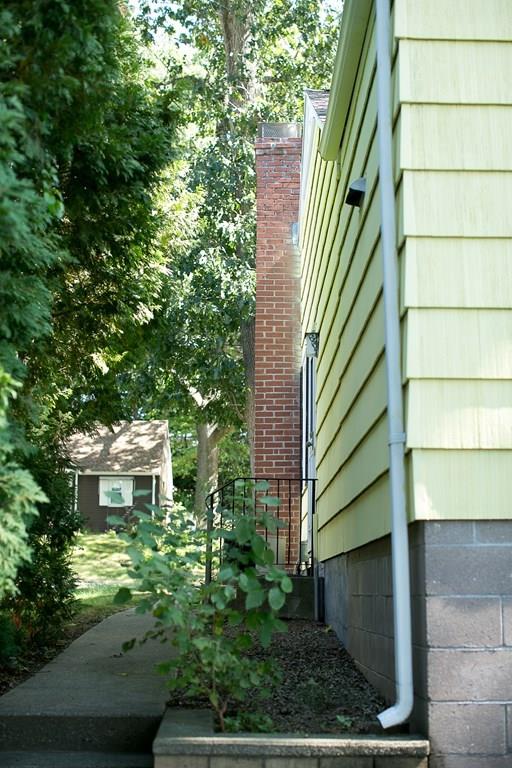 280 Harkness Avenue Springfield, MA 01118 - Photo 4 of 36 a view of a house with a yard