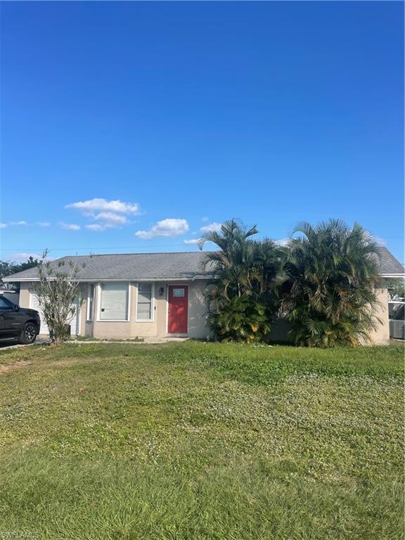 1756 52nd Terrace Southwest Naples, FL 34116 - Photo 1 of 18 a big yard with large trees