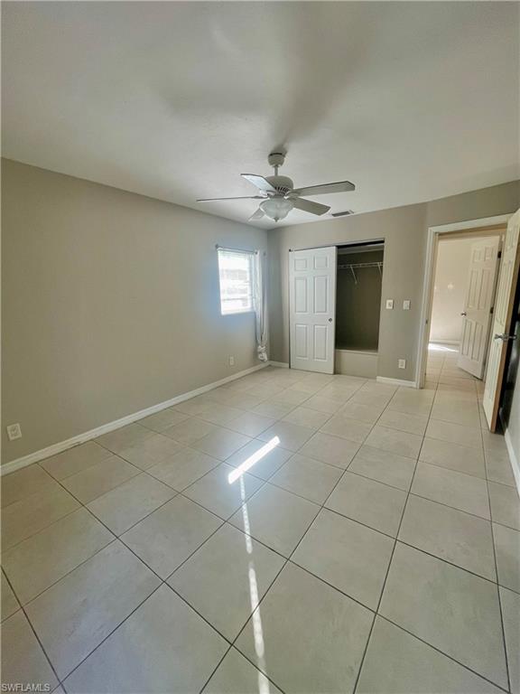1756 52nd Terrace Southwest Naples, FL 34116 - Photo 13 of 18 a view of a livingroom with a staircase