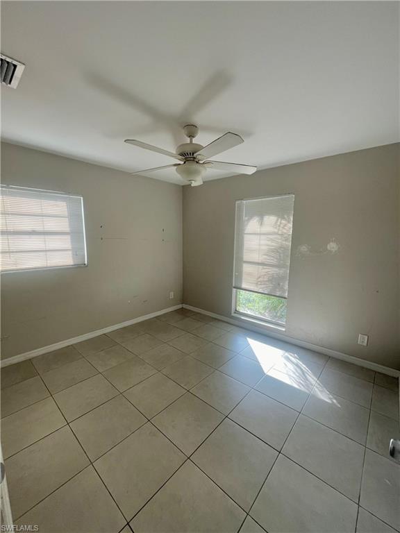 1756 52nd Terrace Southwest Naples, FL 34116 - Photo 14 of 18 a view of an empty room and window