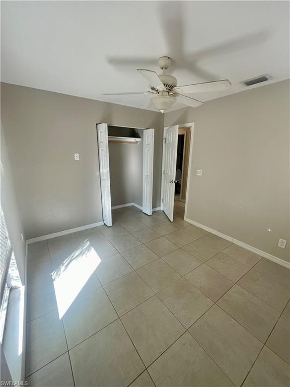 1756 52nd Terrace Southwest Naples, FL 34116 - Photo 15 of 18 a view of a livingroom with a staircase