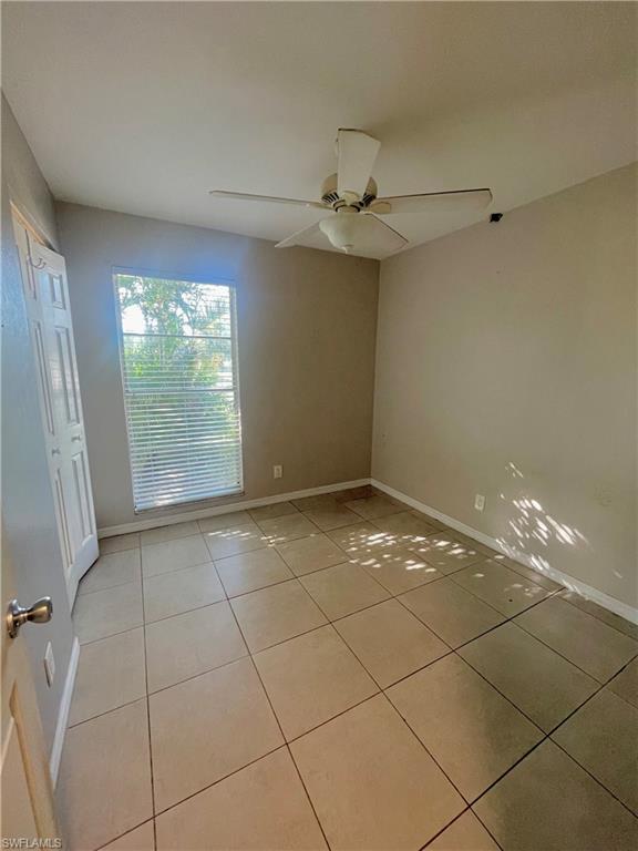1756 52nd Terrace Southwest Naples, FL 34116 - Photo 16 of 18 a view of an empty room with a window