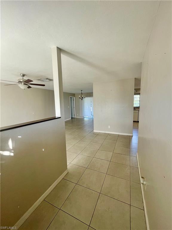 1756 52nd Terrace Southwest Naples, FL 34116 - Photo 3 of 18 a view of a kitchen with a sink