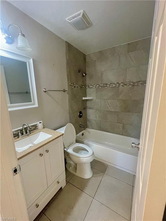 1756 52nd Terrace Southwest Naples, FL 34116 - Photo 10 of 18 a bathroom with a sink a toilet and shower