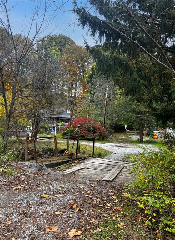 915 Thompson Run Road Harwick, PA 15049 - Photo 3 of 10 Bridge from parking area leading to home