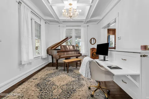 a workspace with furniture and window