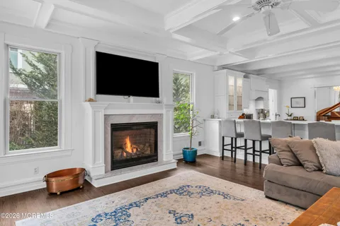 a living room with furniture and windows