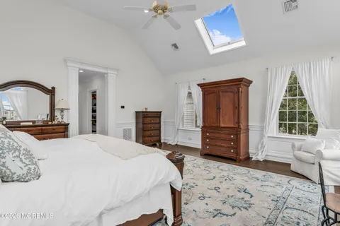 a bathroom with a tub and shower