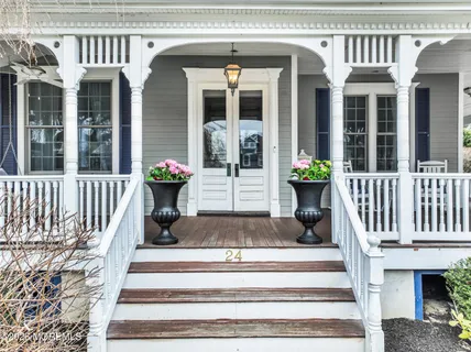 a view of a house with a bench