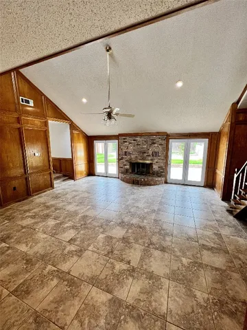 a bathroom with a double vanity sink and mirror