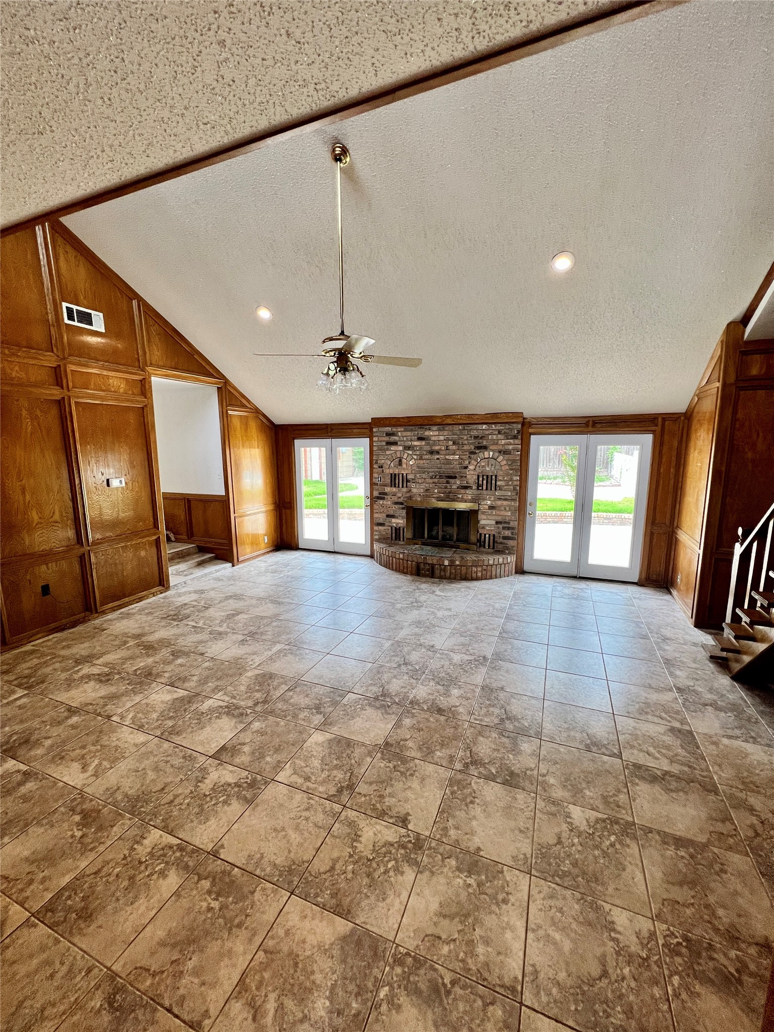 1602 Yokley Road Rockdale, TX 76567 - Photo 12 of 40 a view of empty room with a fireplace and fan