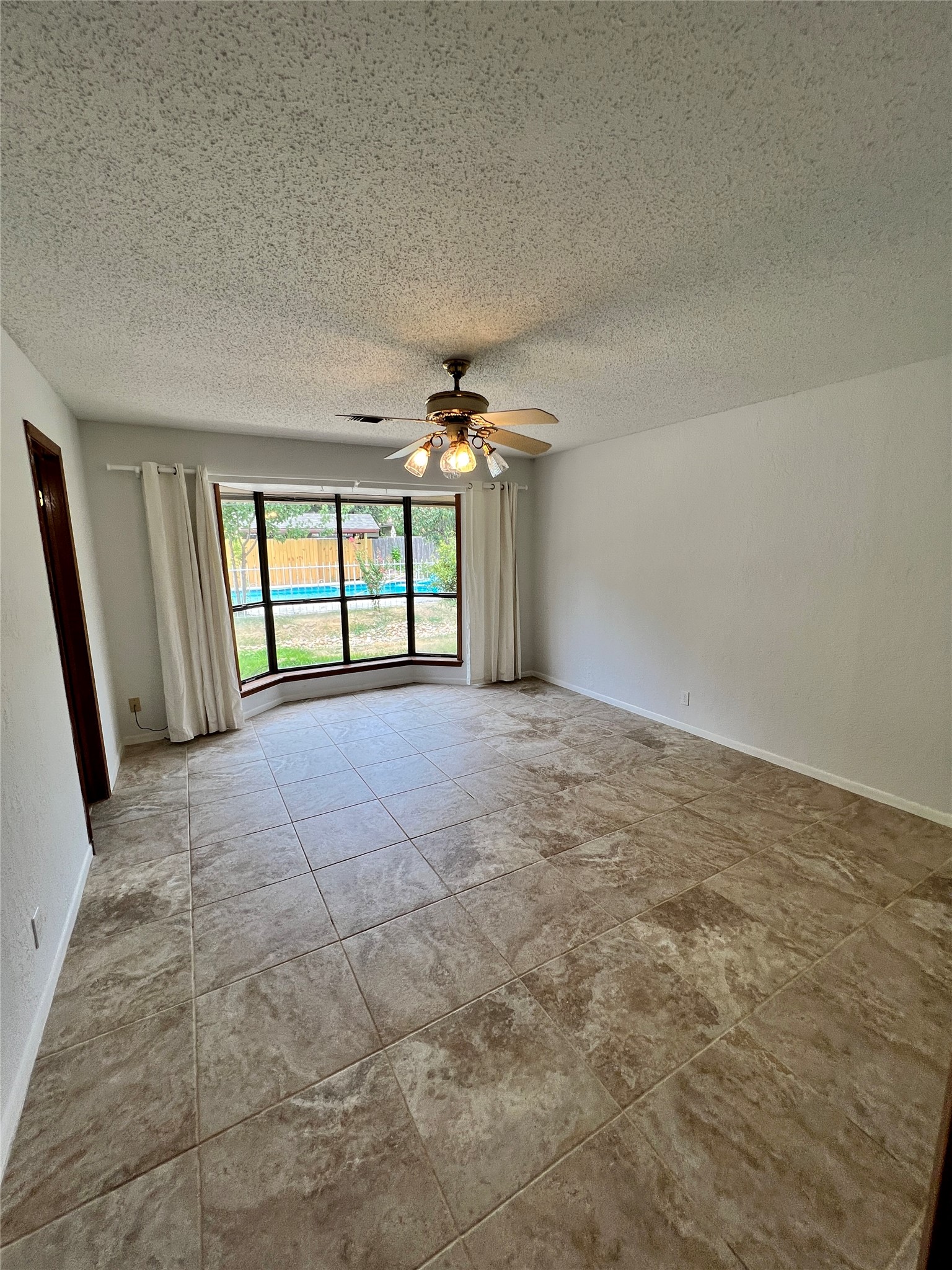 1602 Yokley Road Rockdale, TX 76567 - Photo 19 of 40 a view of an empty room with a window