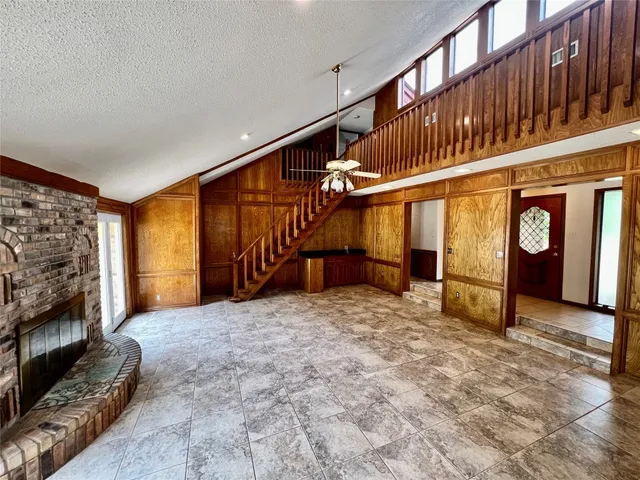 a spacious bathroom with a double vanity sink and a mirror