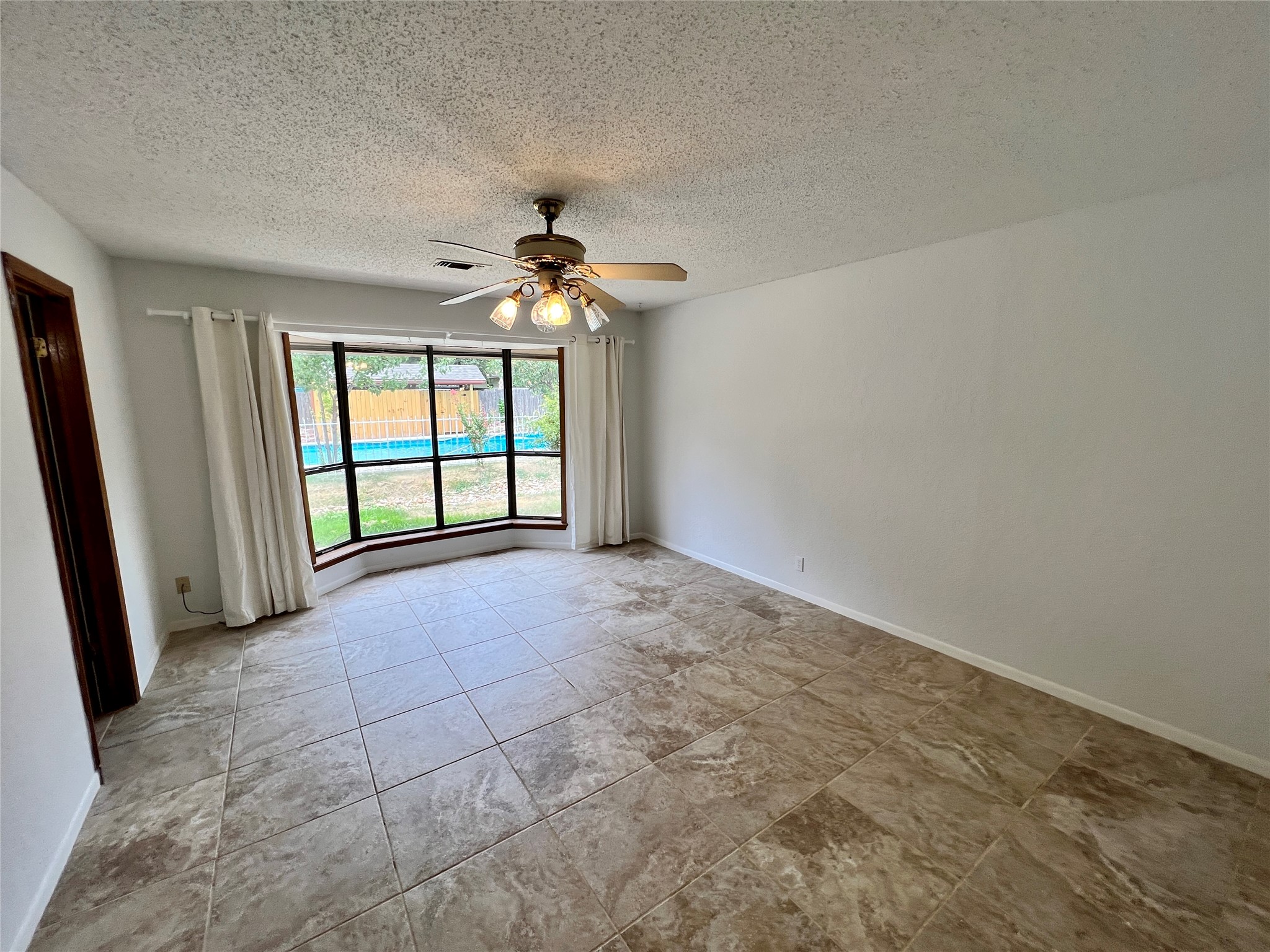 1602 Yokley Road Rockdale, TX 76567 - Photo 38 of 40 a view of an empty room with a window