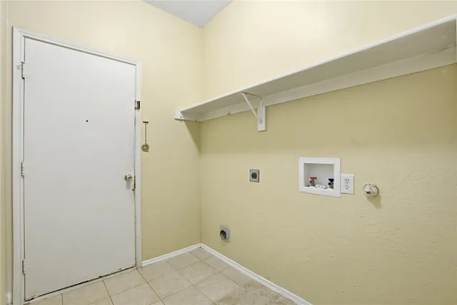 a bathroom with a sink toilet vanity and shower