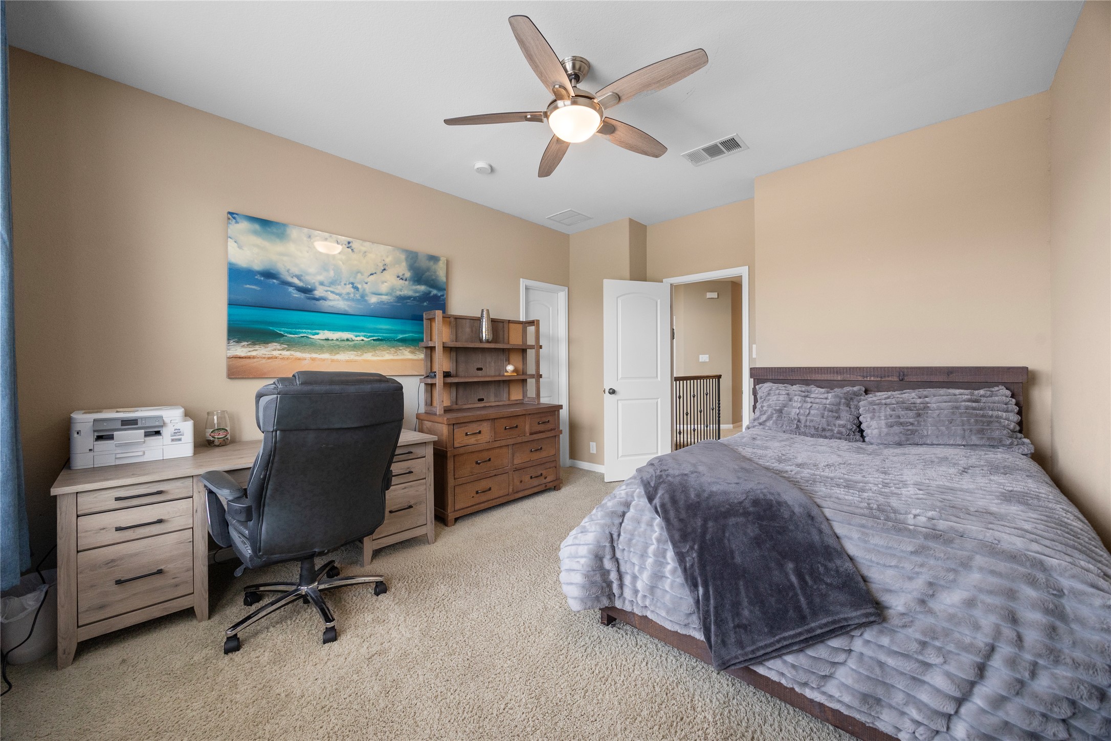 7308 Bandera Ranch Trail, Unit A Austin, TX 78750 - Photo 20 of 27 This room features carpeting, neutral-toned walls, and a ceiling fan with integrated lighting