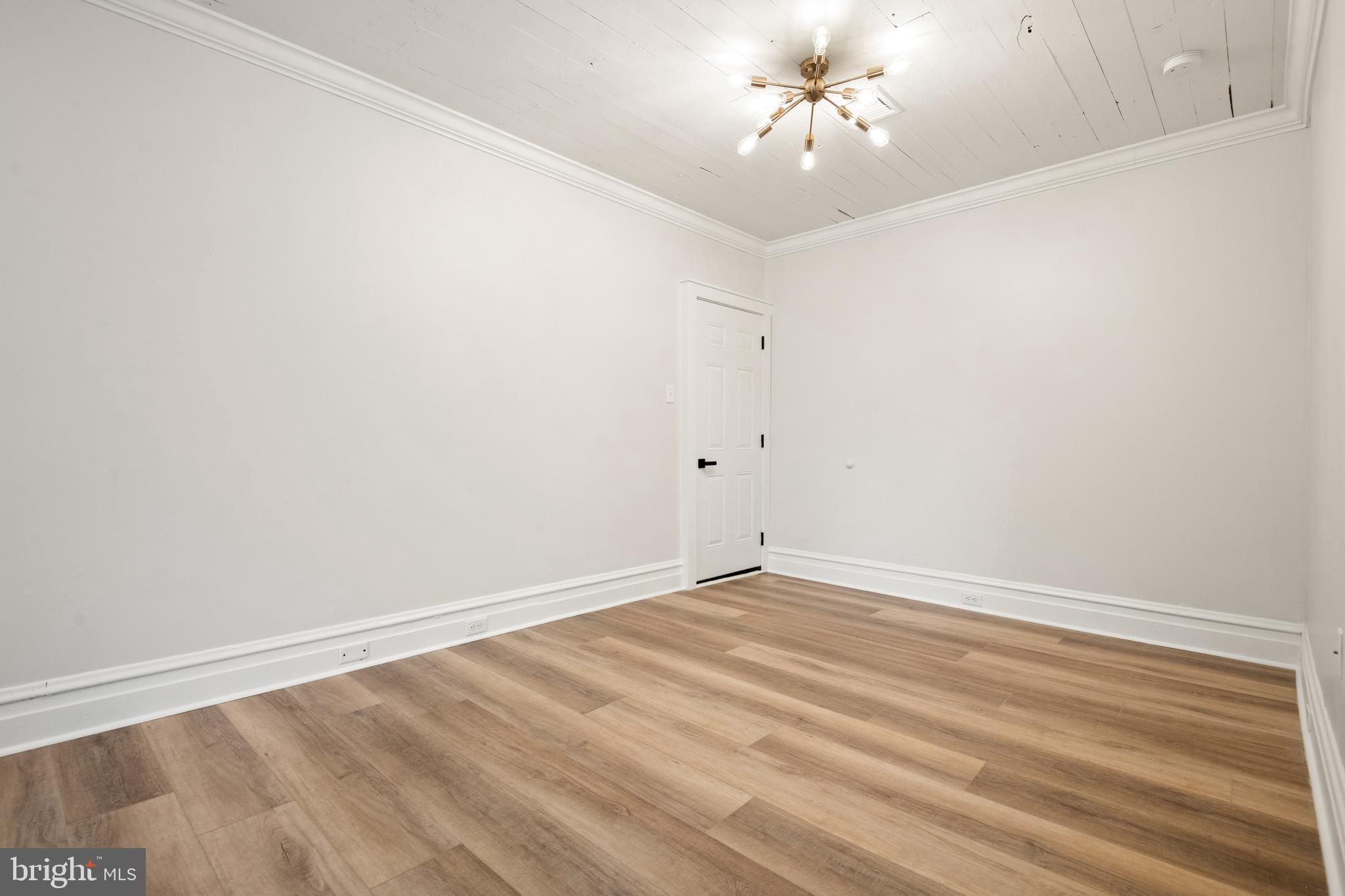 10-14 South Decatur Street, Unit 12C Strasburg, PA 17579 - Photo 4 of 12 a view of an empty room with a ceiling fan